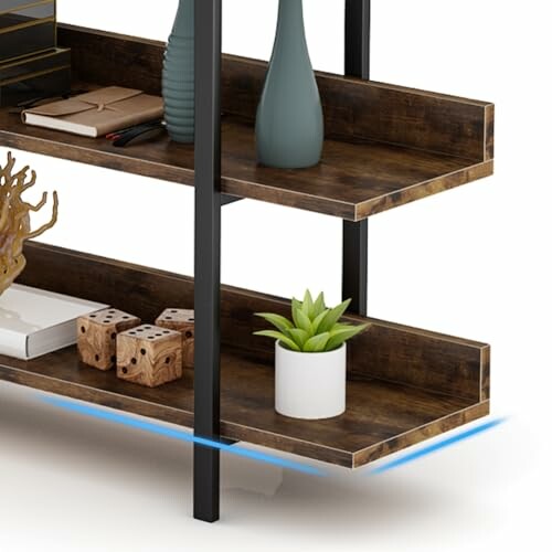 Wooden shelf with decor items including a plant and dice.